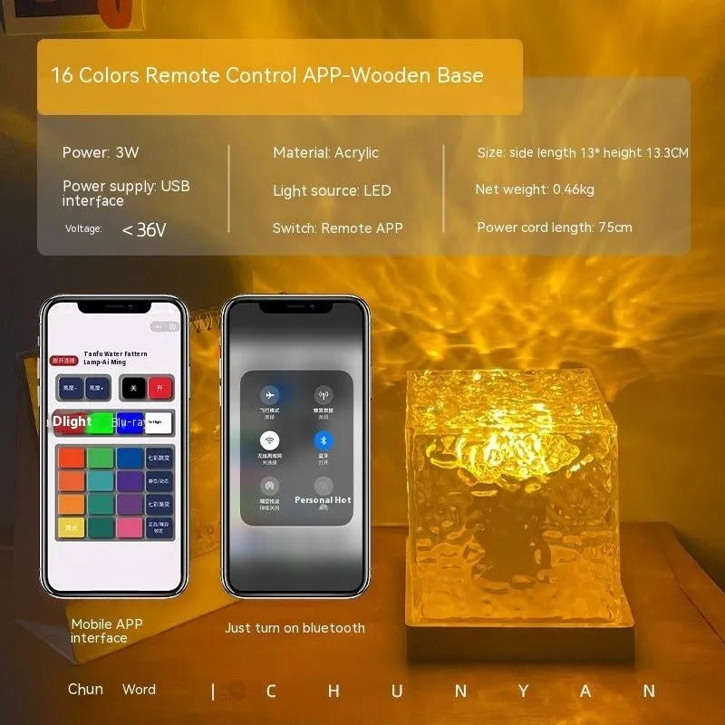 LED water ripple projection night light with remote control on wooden table