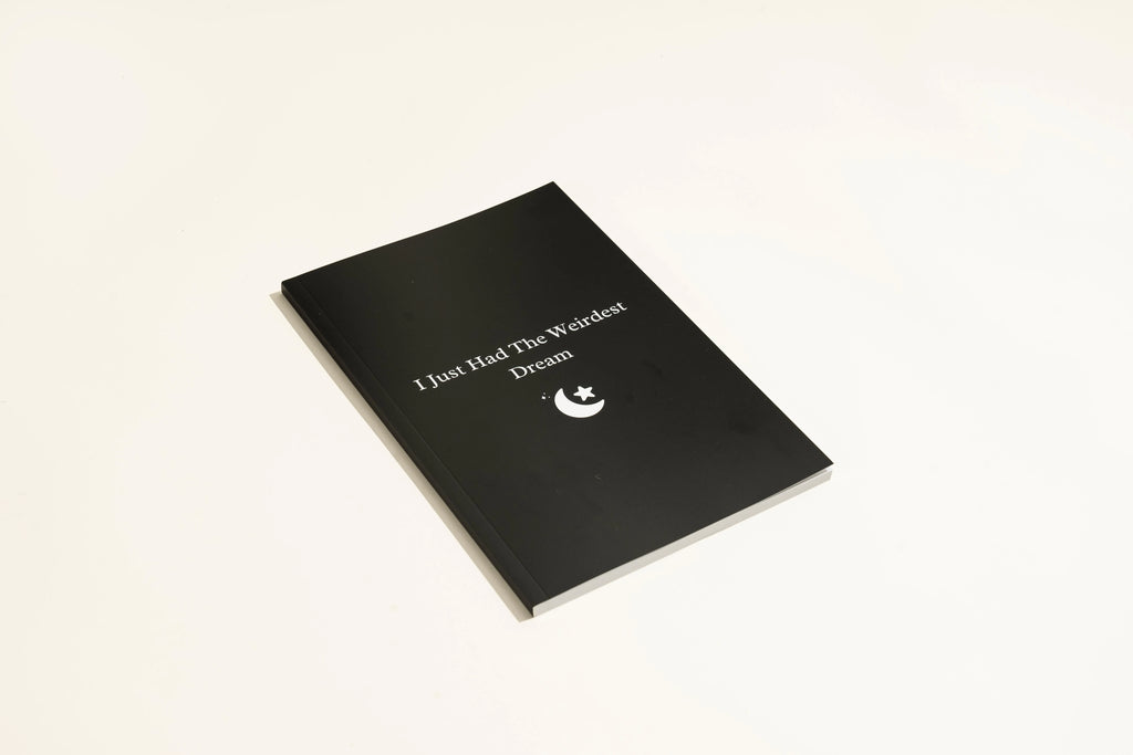 Black hardcover dream journal notebook with a business simplicity design.