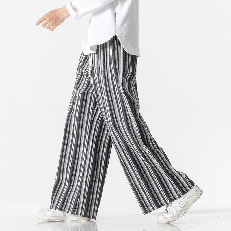 Vintage stripe loose straight leg mopping pants in cotton blend fabric on a hanger