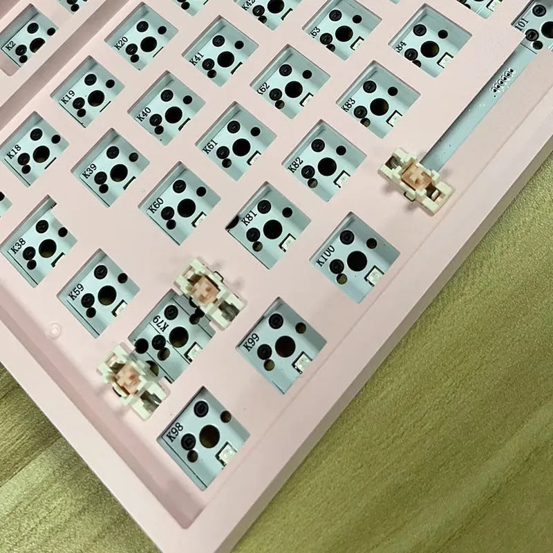 DIY hot-swappable mechanical keyboard kit with plastic case in multiple colour options