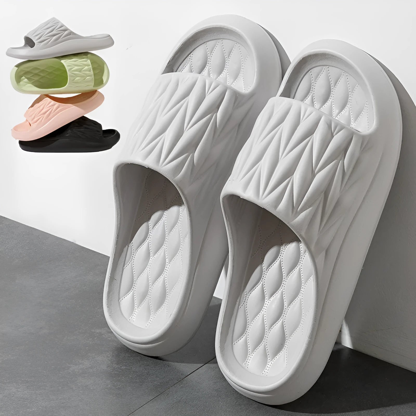 Leaf texture pattern EVA foam slippers for men and women in various colours on a white background.