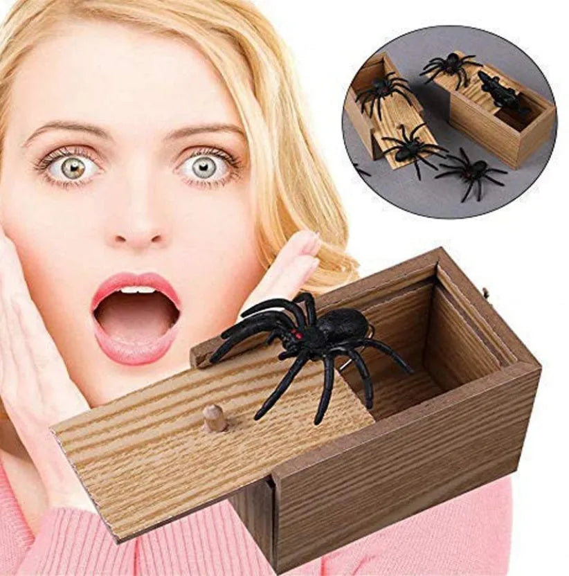 Wooden prank scare box with jumping spider surprise for April Fools jokes