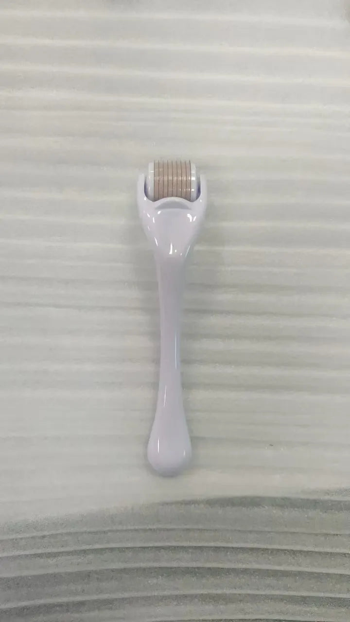 540 micro needle mechanical derma roller with black handle and coloured wheel options