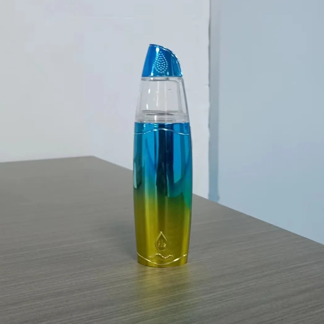 Peacock blue handheld USB rechargeable facial steamer for skin hydration.