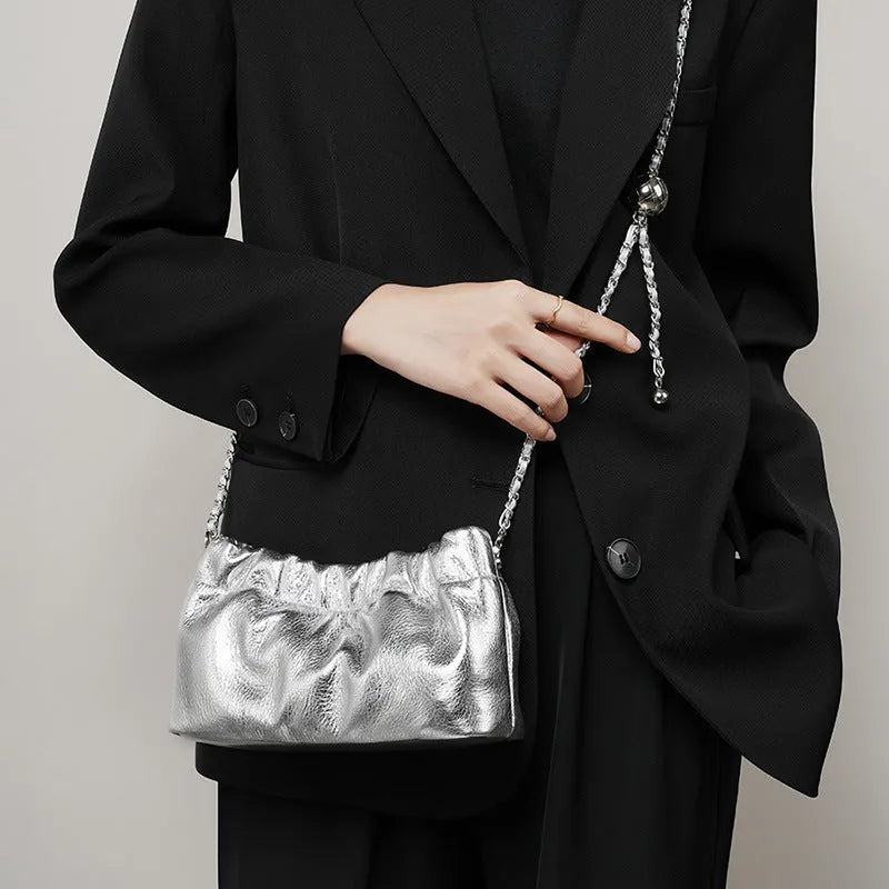 Women's genuine leather dumpling-shaped crossbody bag in black with single shoulder strap