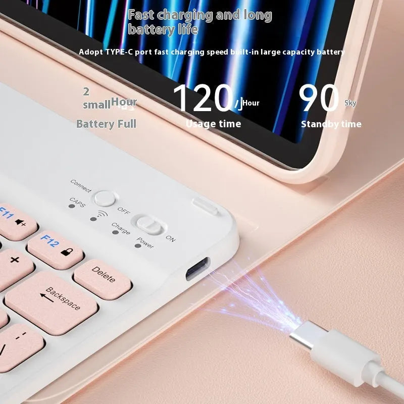Girls Bluetooth keyboard in Lavender colour on a desk next to a tablet