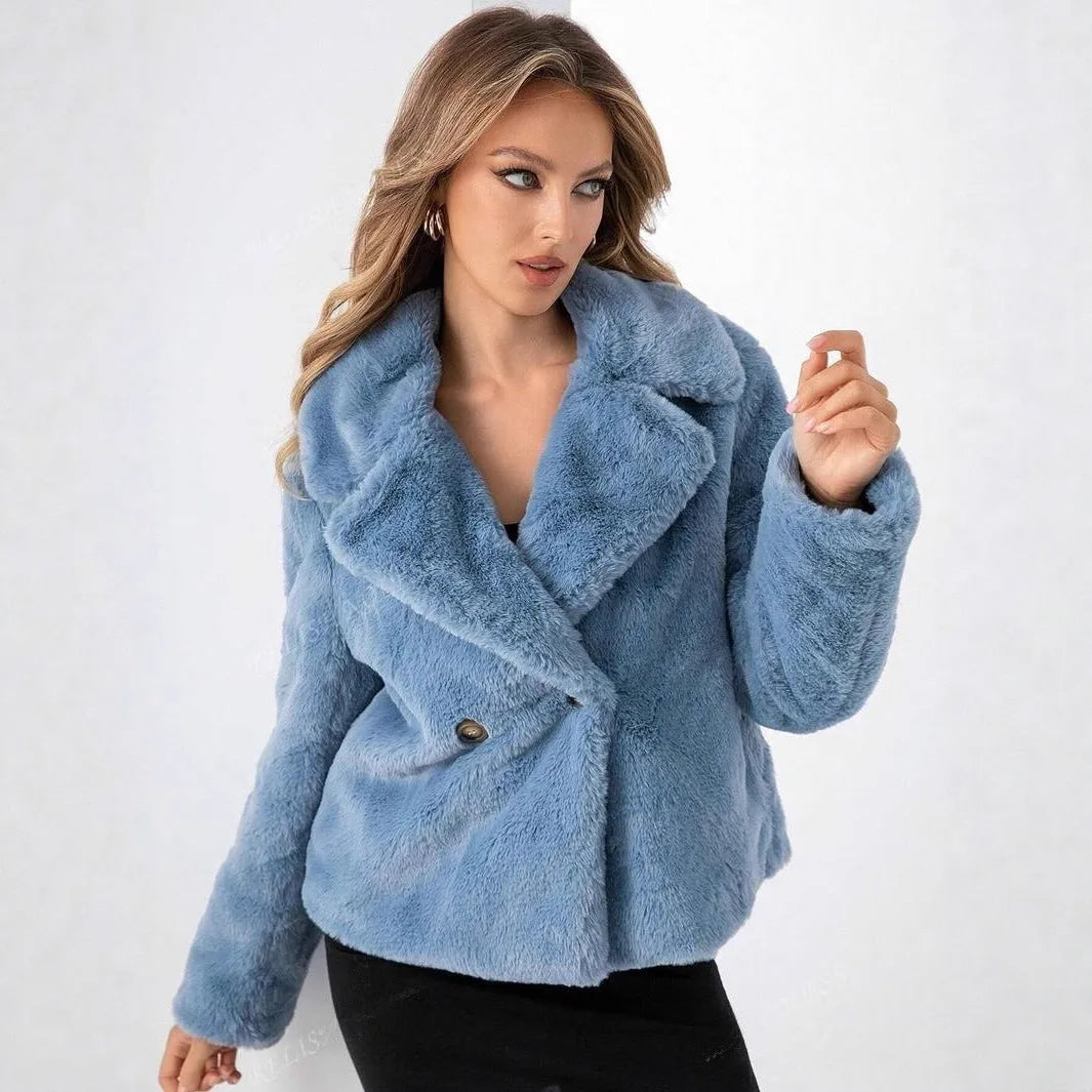 Short loose women's coat in rose red artificial faux fur with regular sleeves.