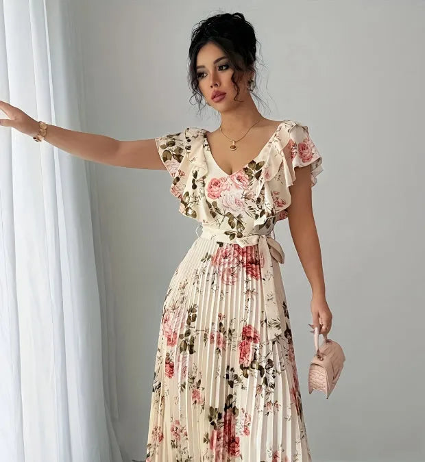 Apricot floral print women's dress with V-neck, ruffle sleeves, and a high-waisted A-line skirt.