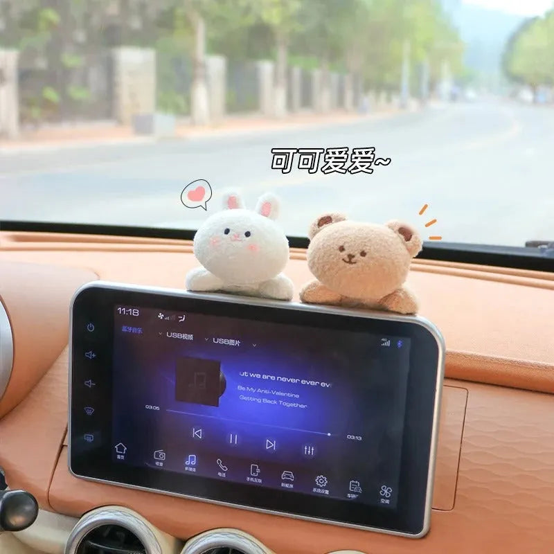 Soft fabric plush doll car decoration in cute bear and bunny cartoon designs.