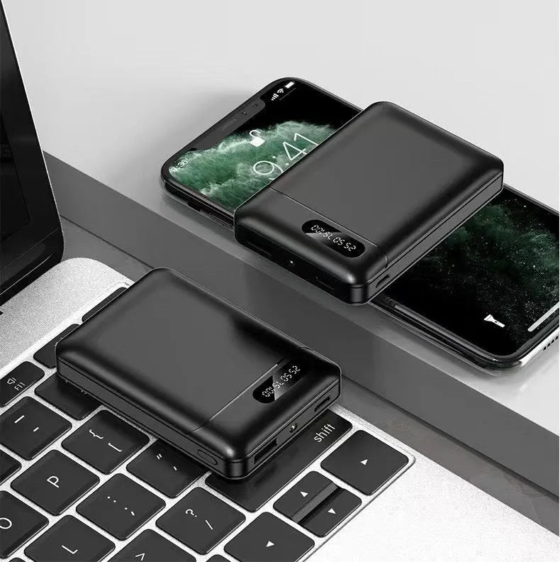 Black and white 10000mAh portable power bank with USB ports