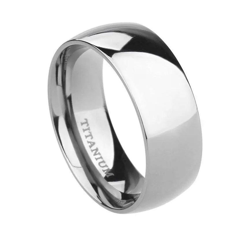Silver titanium steel ring shown in a minimalist style on a finger, demonstrating its width options.