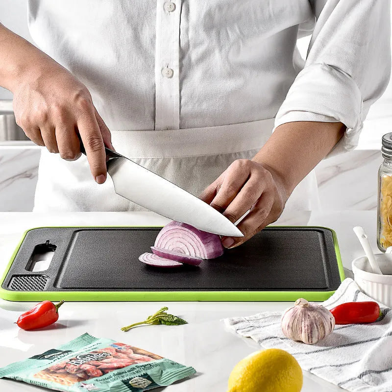 Grey square aluminium cutting board with double sides, integrated knife sharpener and grinding surface