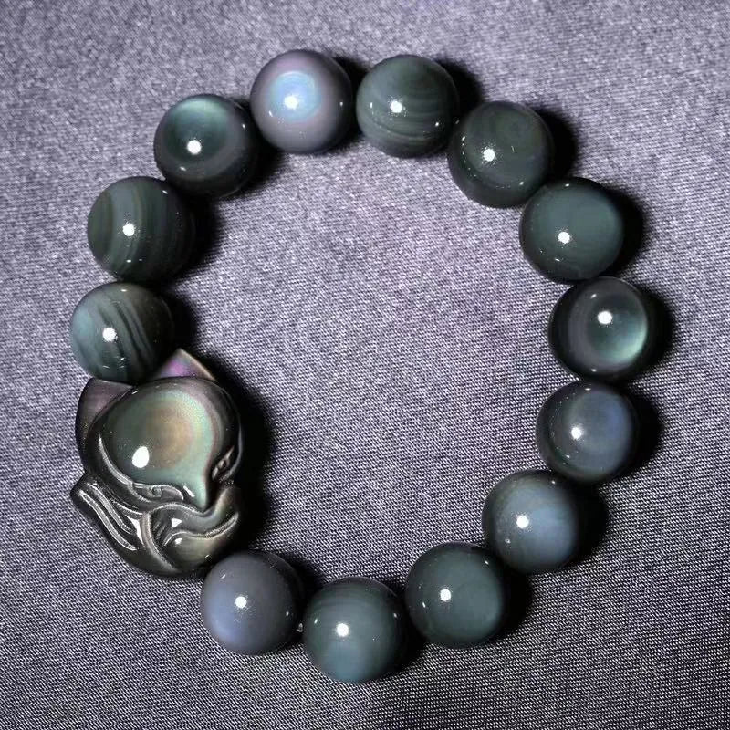 Obsidian stone bracelet with carved fox design, showing 10mm, 12mm, 14mm and 16mm bead size options