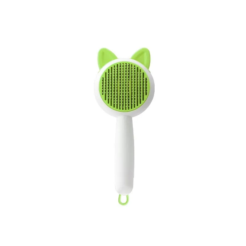 Self-cleaning pet hair comb for cats in greenish white and orange white colour options