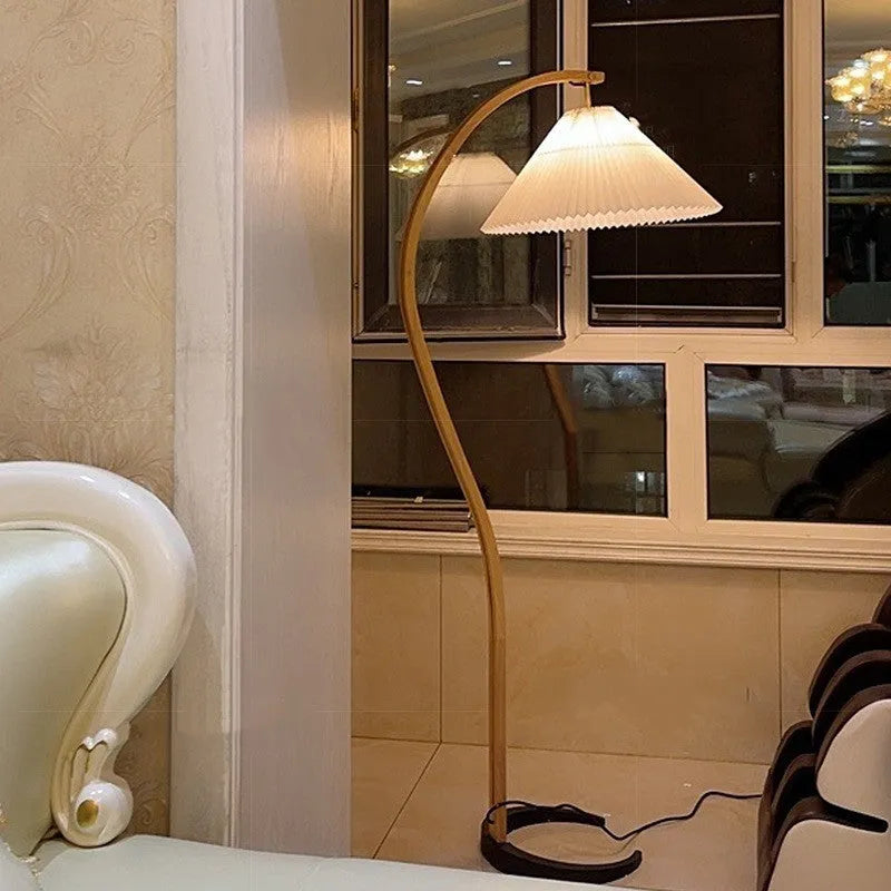 Vertical retro-style table lamp with a choice of log white or wine red shade on a narrow table.