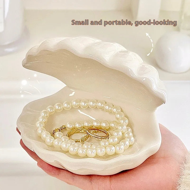 A white porcelain tray with a matching small night light, in pink or white, for a girl's bedroom.