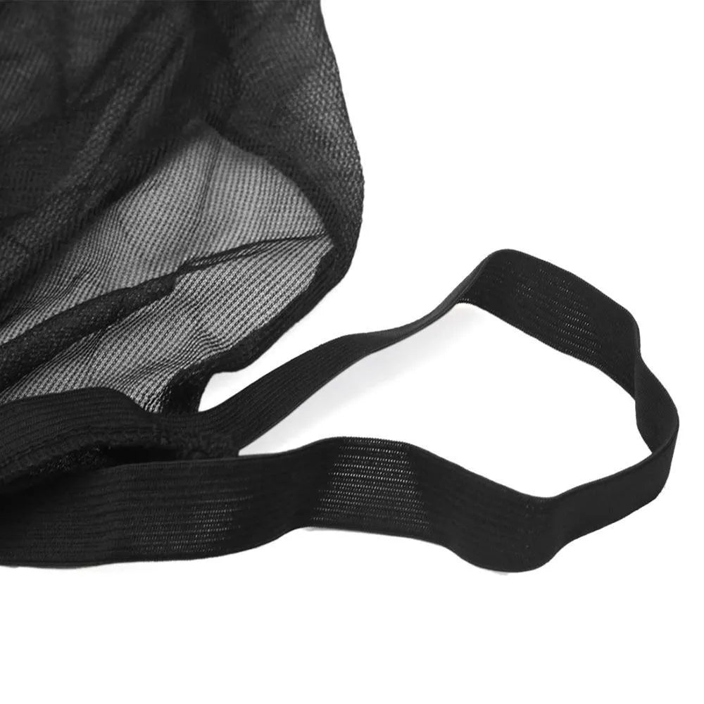Car side window mesh sunshade showing non-woven fabric screen with elastic edge installation on vehicle window