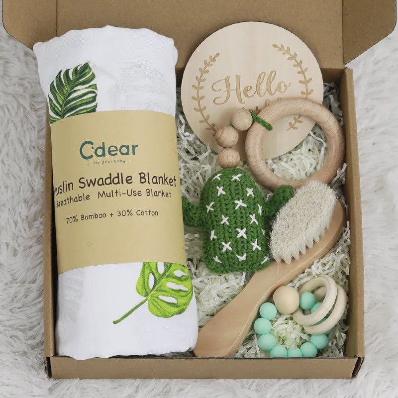 Baby teething gift set with wooden toys and large bamboo-cotton gauze blanket in assorted colours