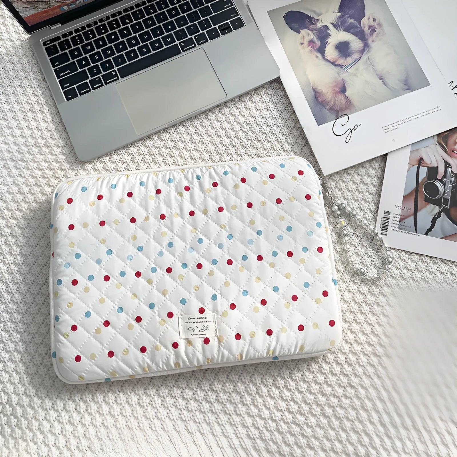 Polka dot patterned polyester laptop bag for women, shown in a solid colour with size options for 11, 13/14, and 15/15.6 inch laptops.