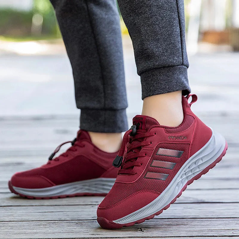 Breathable mesh elastic slip-on shoes for men and women in various colours on a non-slip sole.
