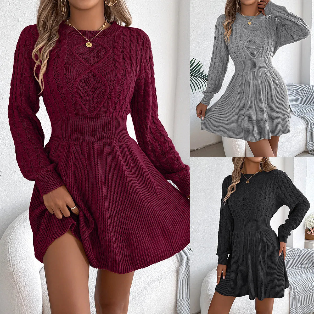 Woman wearing a black lantern sleeve sweater dress with an elastic fitted waist.