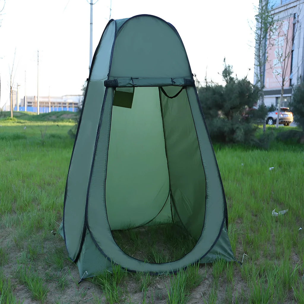 Blue and silver fast-opening camping changing tent set up outdoors with two windows.