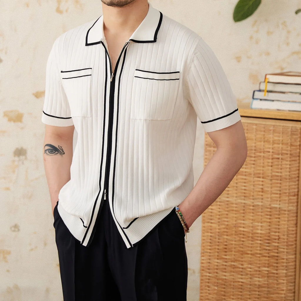 Slim black elastic lapel polo shirt on a hanger, showing short sleeves and knit texture.