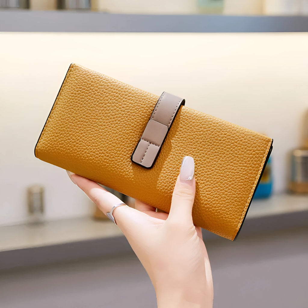 Large capacity women's handbag in PU leather available in multiple colours with polyester lining