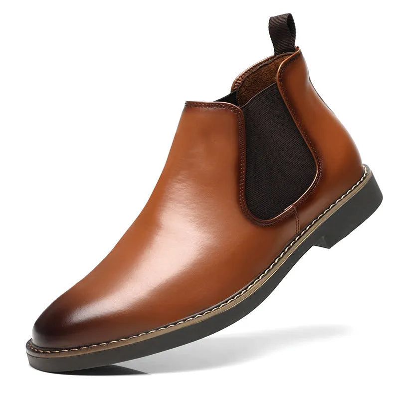 Men's black British-style chukka boot with a mid-calf height, flat square heel, and rubber sole.