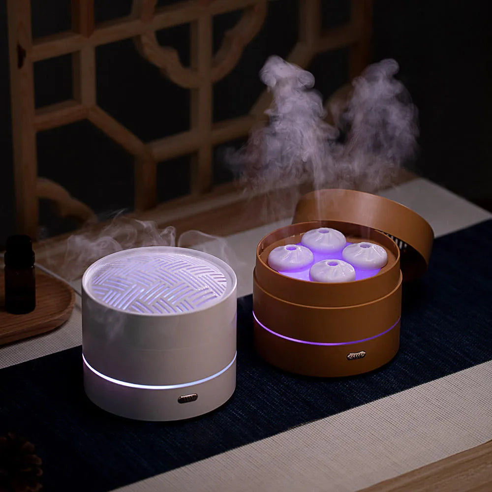 Coffee coloured aroma diffuser with four spray nozzles and LED light display