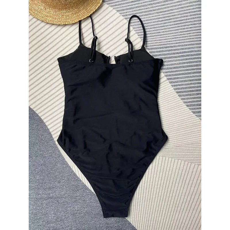 Black women's tight-fitting one-piece nylon swimsuit on a mannequin