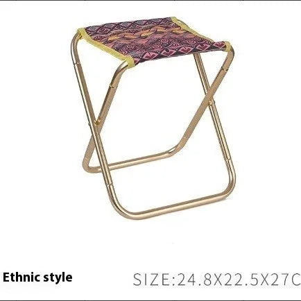 Black aluminium alloy folding camp stool in the open seating position.