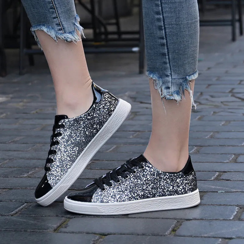 Women's black, pink, and gold sequinned casual lace-up shoes with a round toe and leather lining.