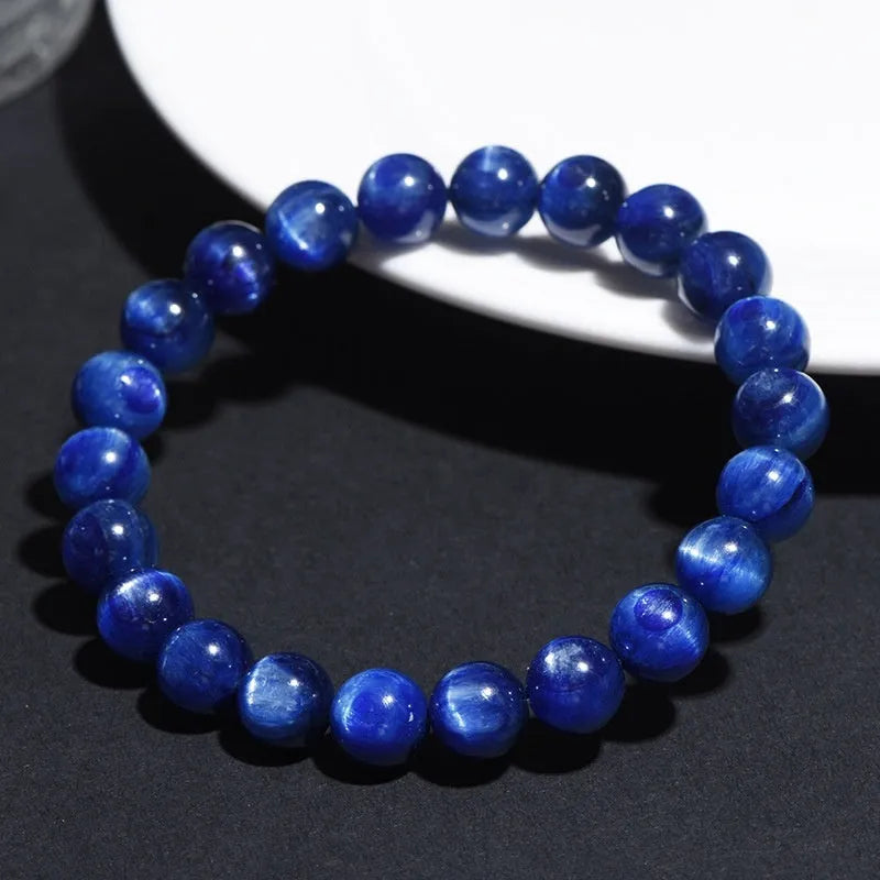 Blue crystal ball bracelet with polished 10-12mm spherical beads in single circle geometric design