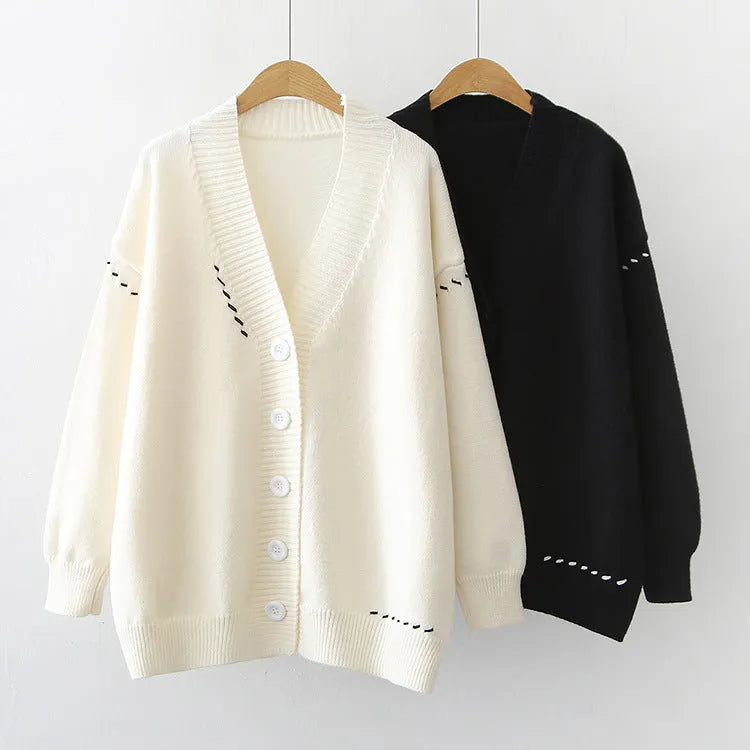 Women's loose-fit knitted cardigan coat in black or white, long sleeve