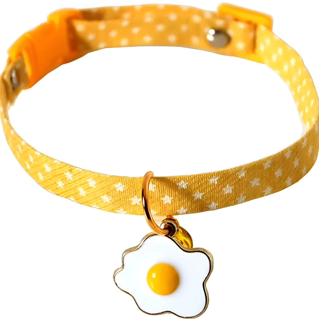 Adjustable cat collar with bell and bow tie decoration on small dog