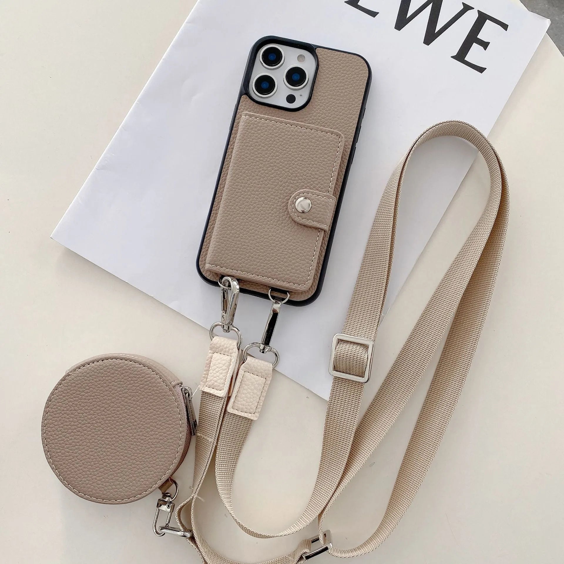 PC leather phone case with card holder slot and lanyard loop for Apple iPhone, shown in black.