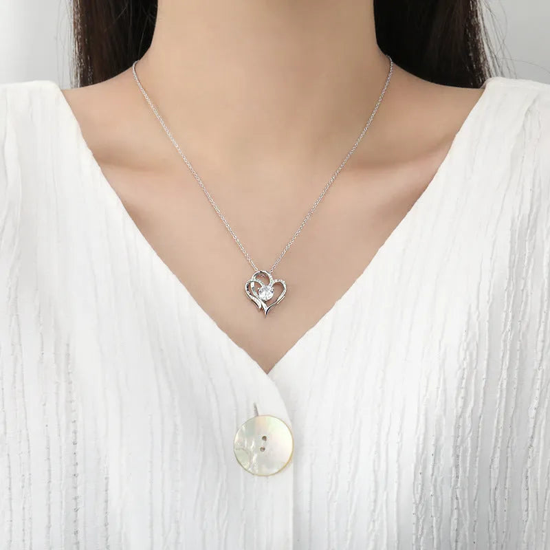 Heart shaped pendant necklace for women in rose gold, white, or yellow finish on a silver chain
