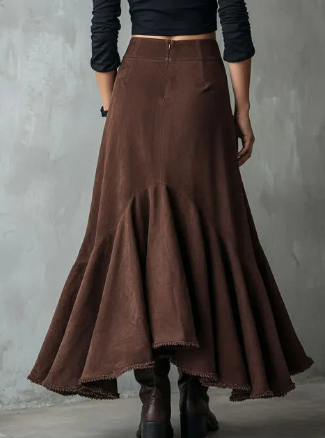 Western brown high-low maxi skirt with ruffled ankle hem laid flat.