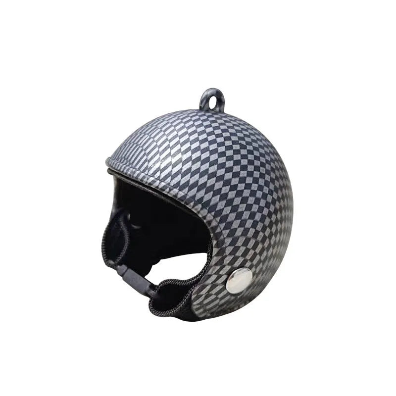 Plastic chicken helmet pet accessory in various colours and designs for poultry headgear.