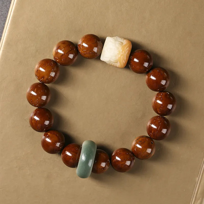 Hand-woven 13mm lion bead bracelet in ivory nut, sandalwood or yellow gradient bodhi style