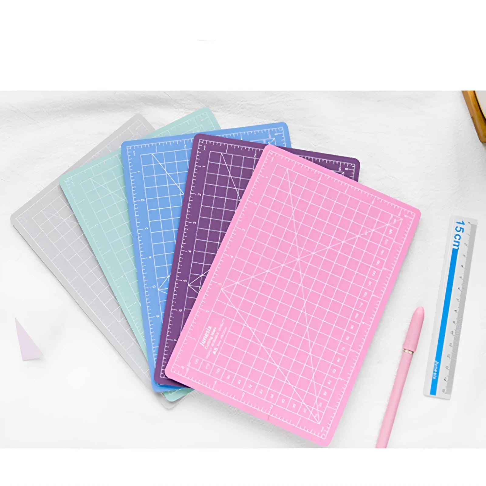 Art pen knife cutting board set in chosen colour with backing board, ruler, pen sharpener, and blade.