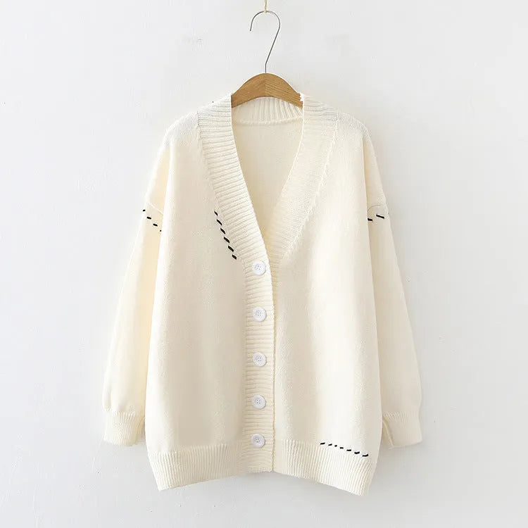 Women's loose-fit knitted cardigan coat in black or white, long sleeve