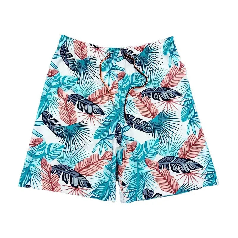 Men's cropped beach swimming trunks in a multicolour leaf pattern, briefs style