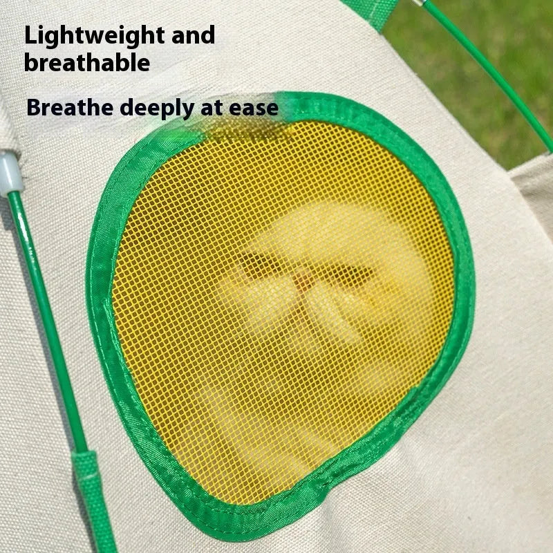 Beige dome-shaped cloth cat tent with a thick padded mat inside, shown on a wooden floor.
