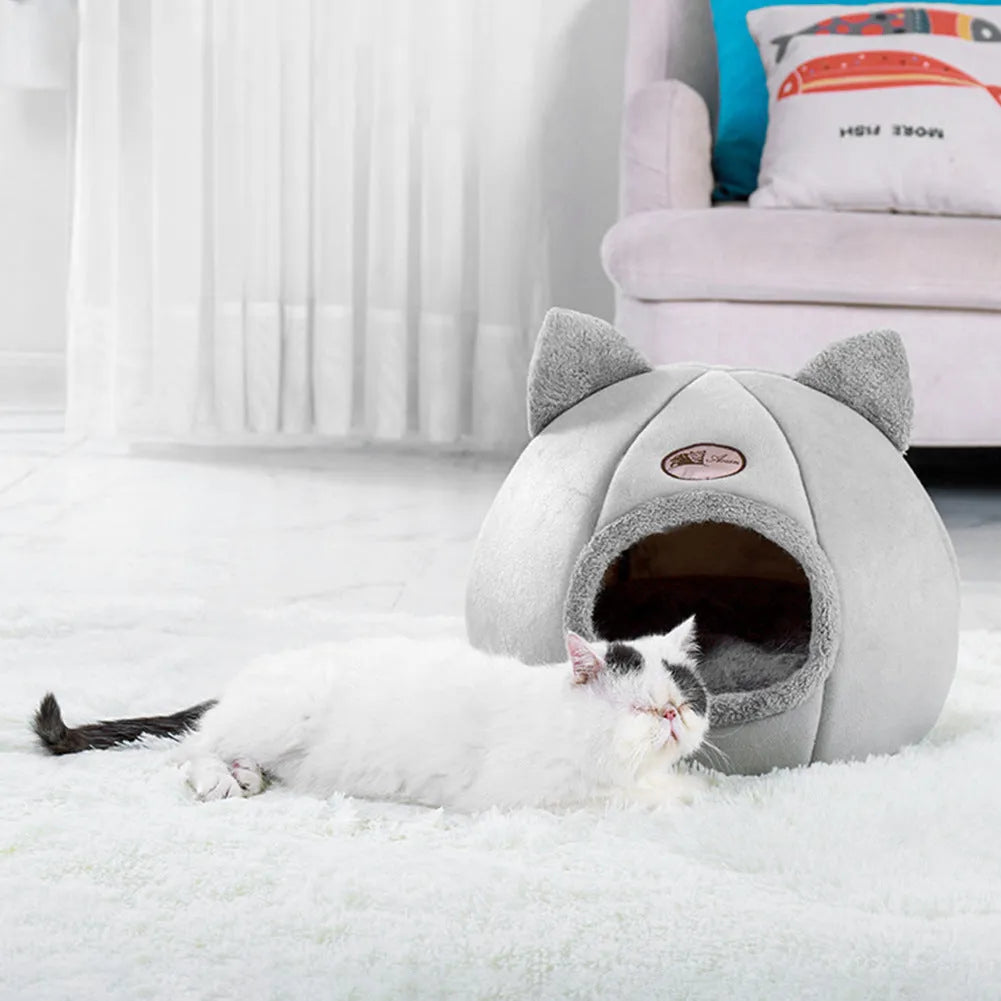 Large grey enclosed sofa-style winter nest cat bed for indoor cats, showing removable fleece lining.