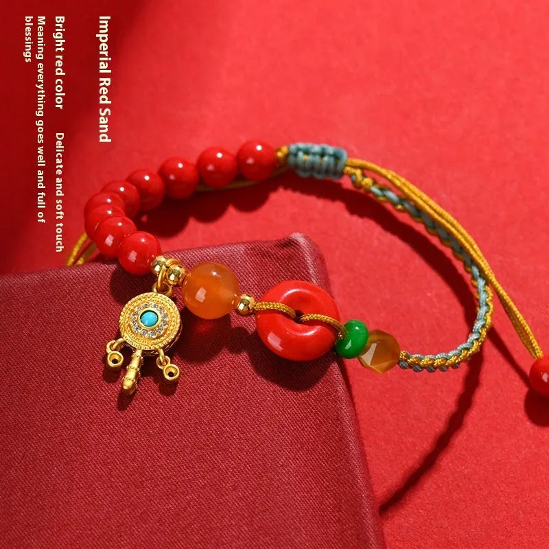 Emperor red sand cinnabar bracelet with hand-woven geometric patterns and peace buckle closure