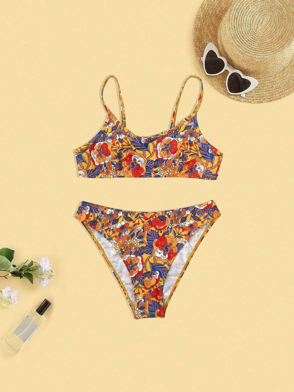 Plus size women's floral print bikini set with strapped design and brief style