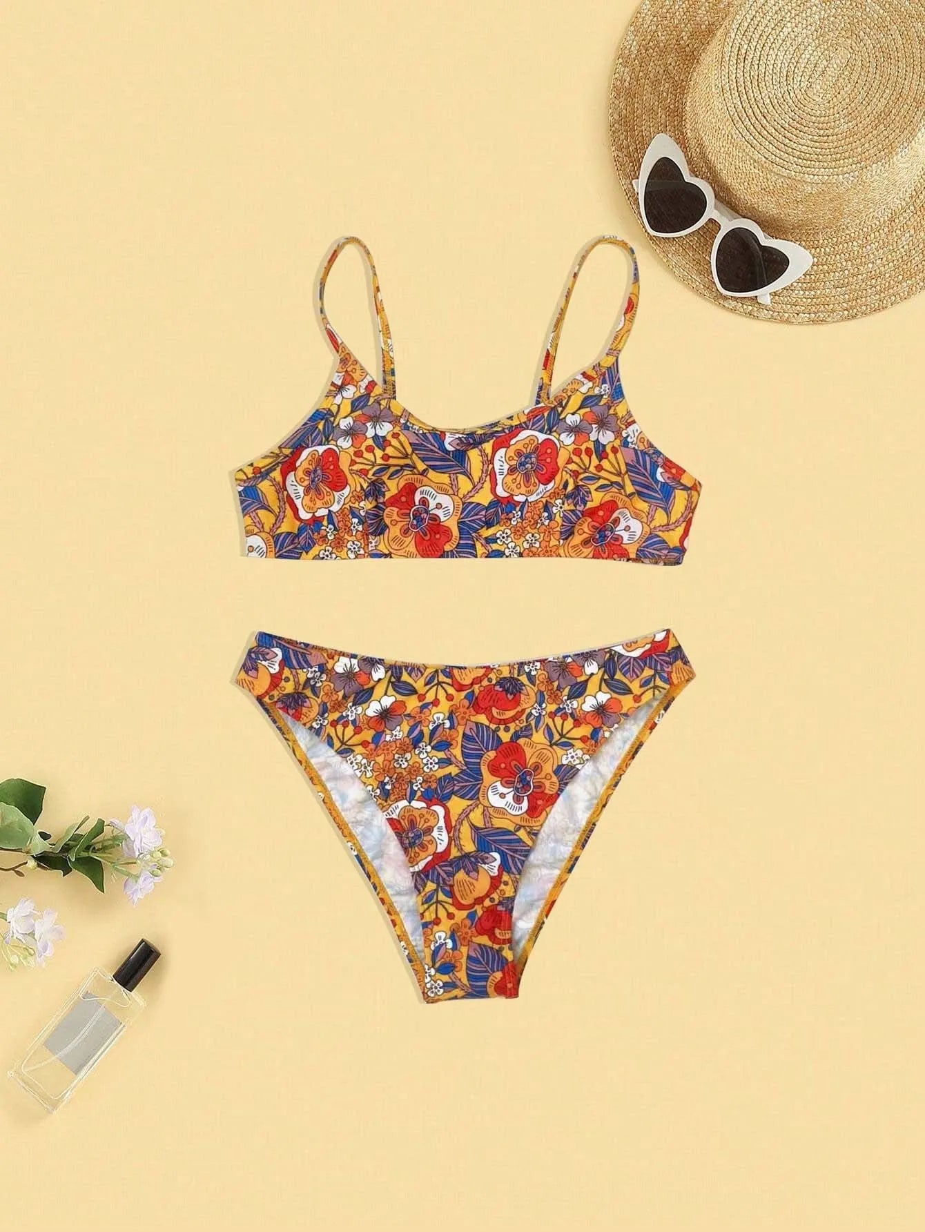 Plus size women's floral print bikini set with strapped design and brief style