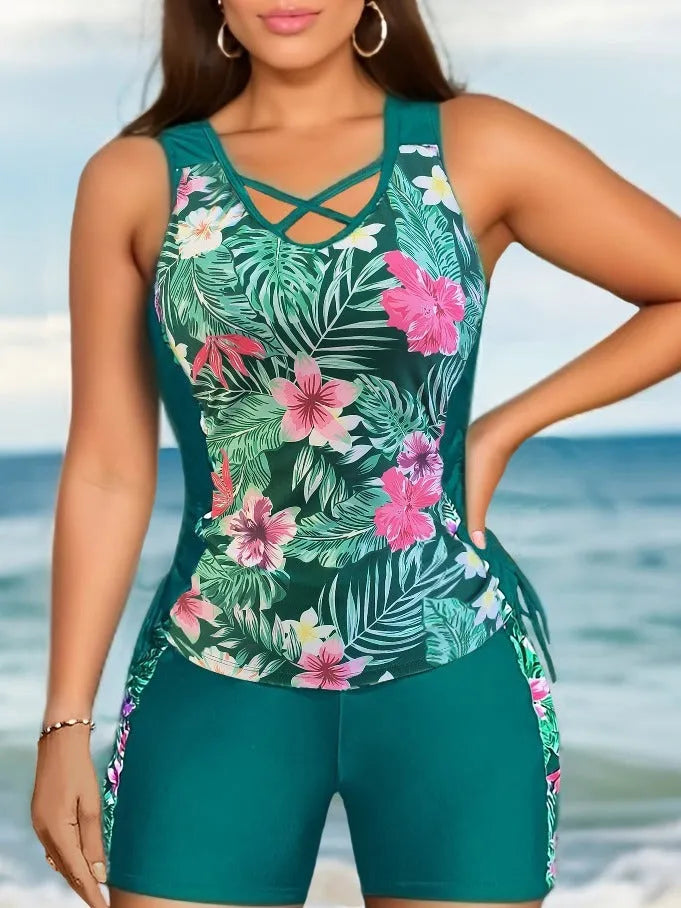 Plus size women's floral print high-waisted bikini for swimming in navy blue, black, green, and blue colours